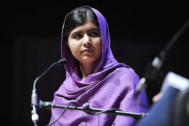 Photo: Malala Yousafzai is a campaigner who in 2012 was shot for her activist work. As part of WOW 2014, she talks about the systemic nature of gender inequality and bringing about change (March 8, 2014) by Southbank Centre/CC-BY-2.0 (via Wikimedia).