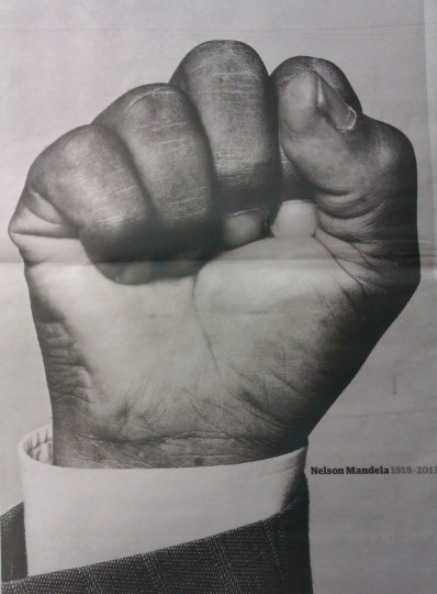 Photograph of life of Nelson Mandela supplement included in print edition of The Guardian, 7th December 2013.