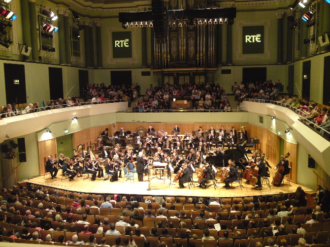 Photo: The RTÉ Concert Orchestra in the National Concert Hall (Oct 3, 2009) by Darragh Doyle - Pix.ie (CC BY-SA 3.0).
